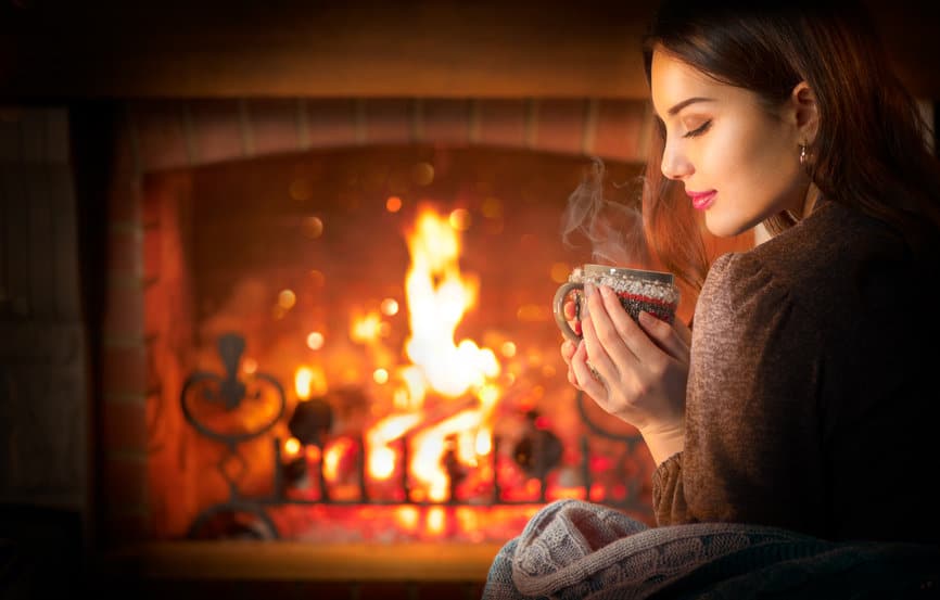 cozy woman drinking tea